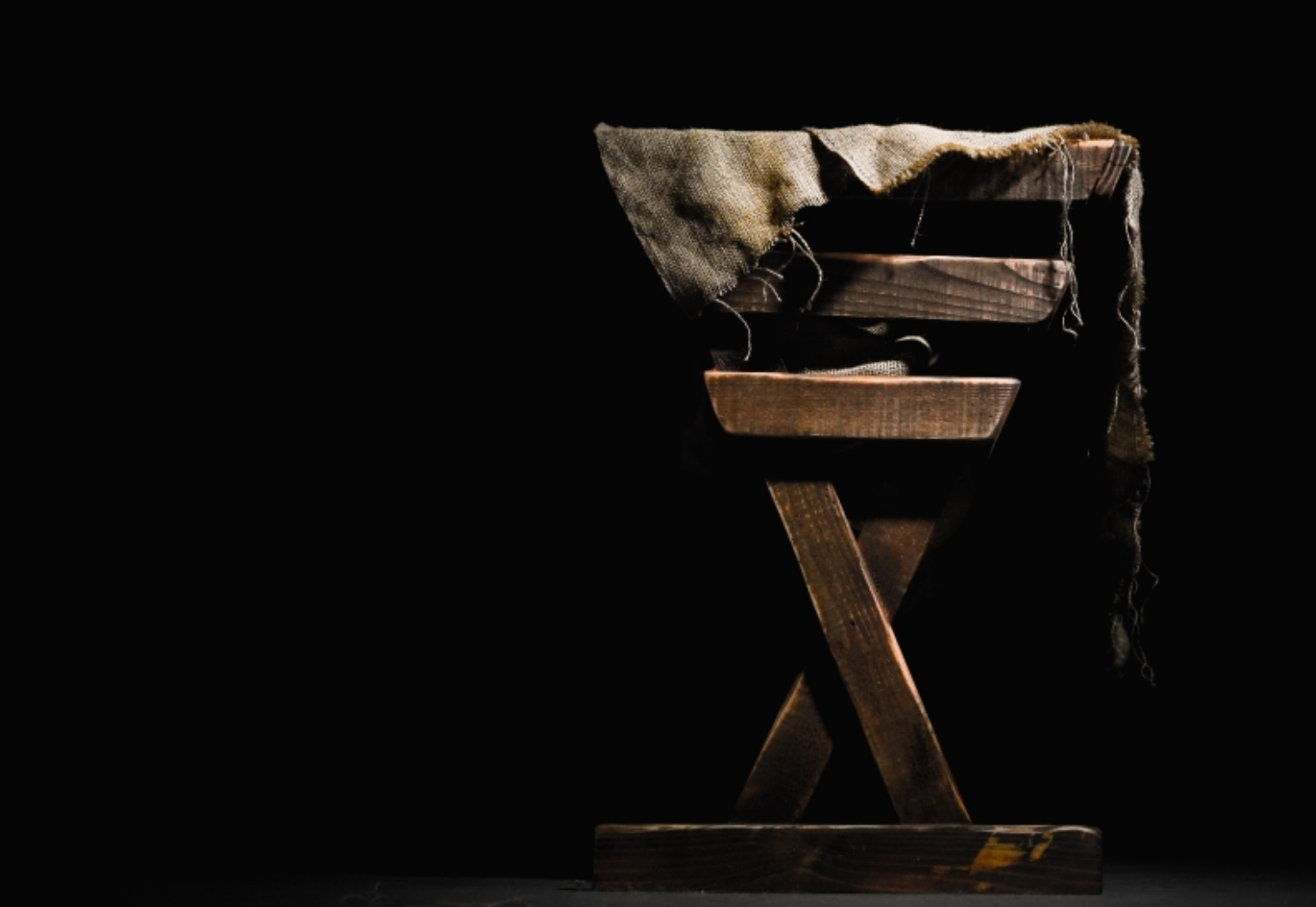 I ringhet klädd på fattigdomens bädd